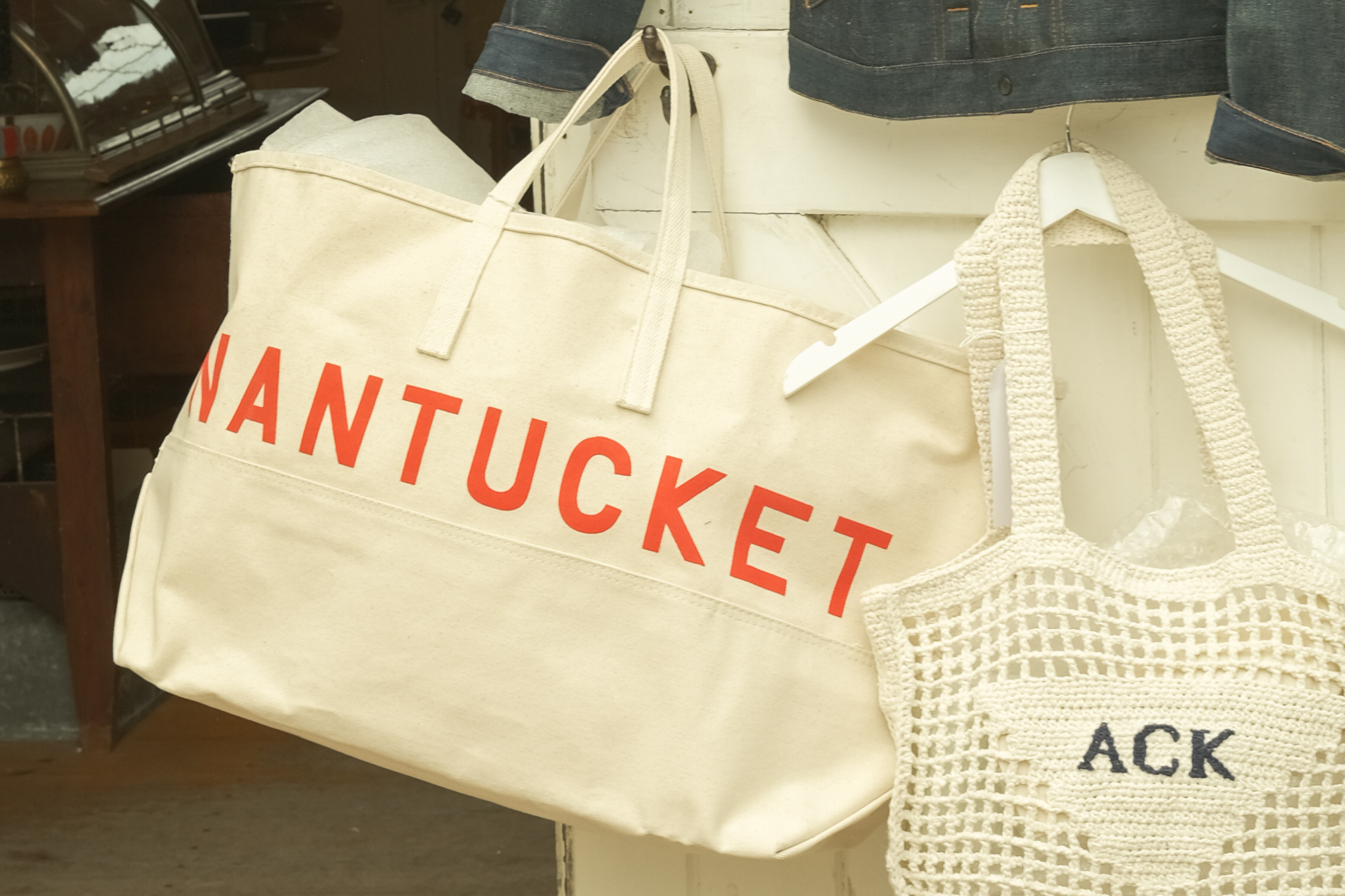 Nantucket and ACK tote bags in a Nantucket storefront